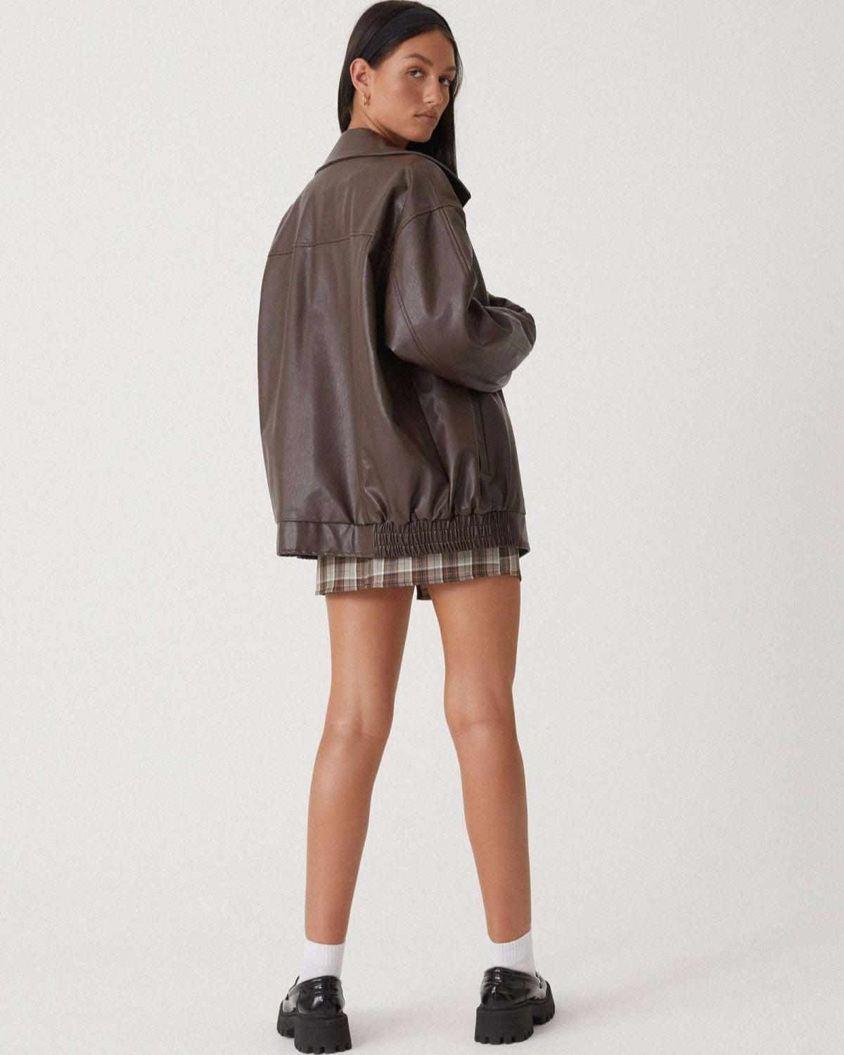 Florence brown leather jacket, model side view with stand collar and zip front