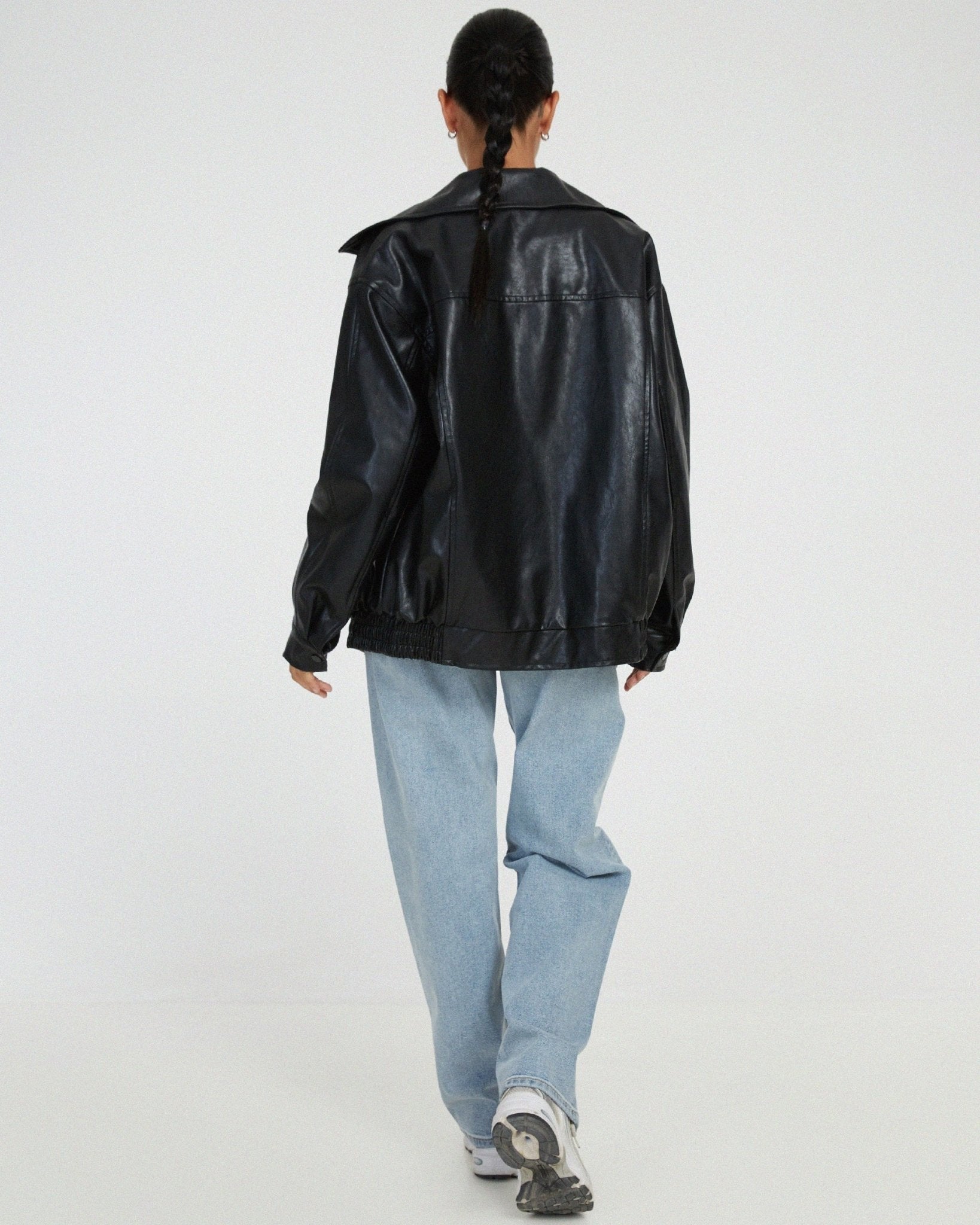 Florence black leather jacket, back view with stand collar and zip closure