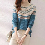 Nordic knit pullover sweater in blue with fair isle yoke and cable texture