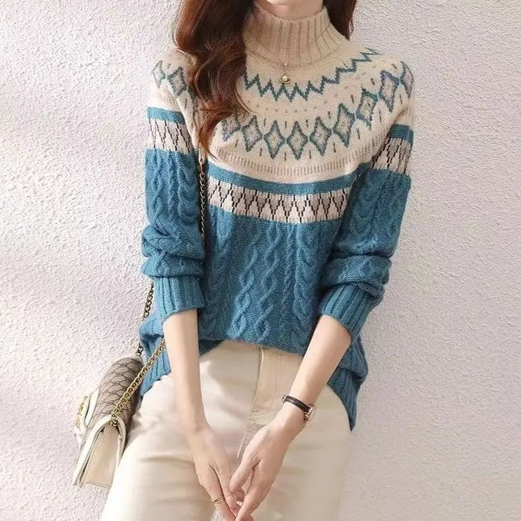 Nordic knit pullover sweater in blue with fair isle yoke and cable texture