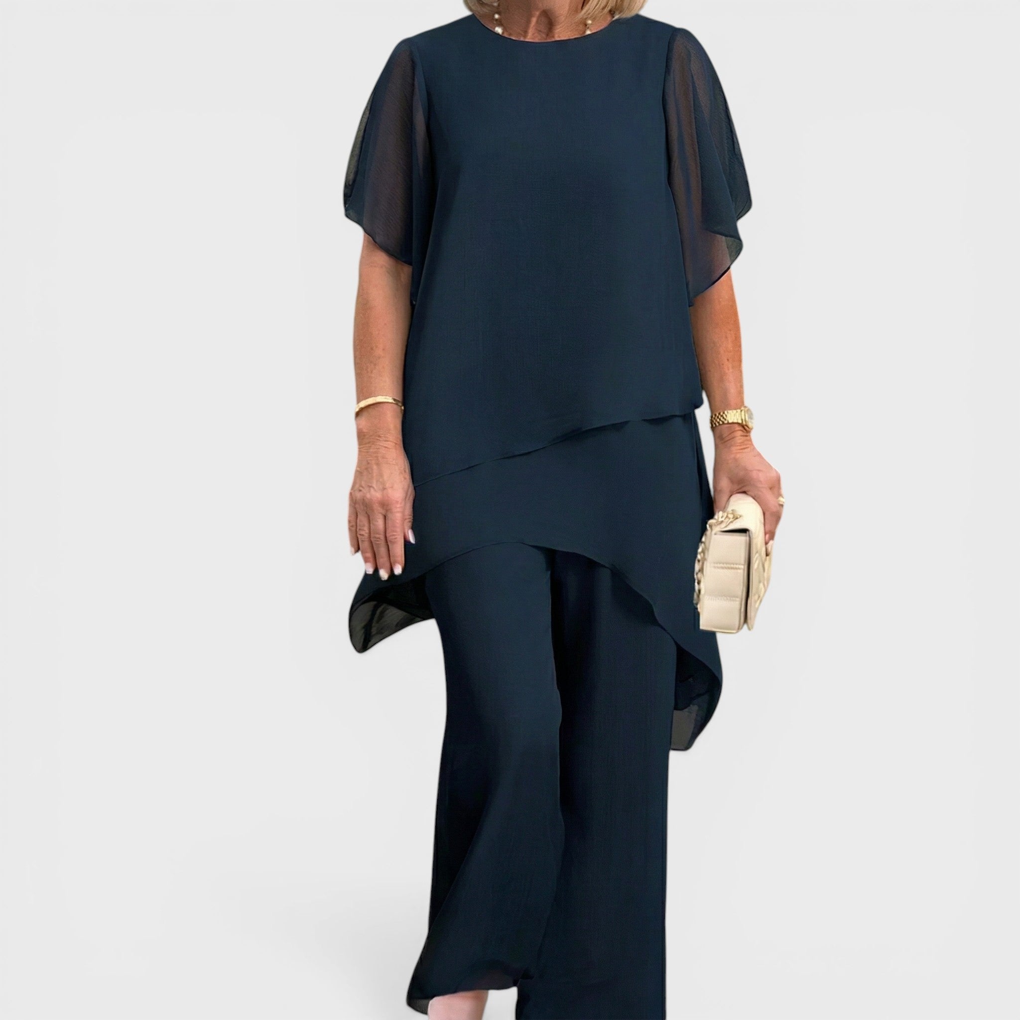 Navy chiffon elegant top and wide-leg pants set with layered drape