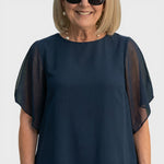 Navy chiffon sheer-sleeve top with relaxed fit and crew neckline