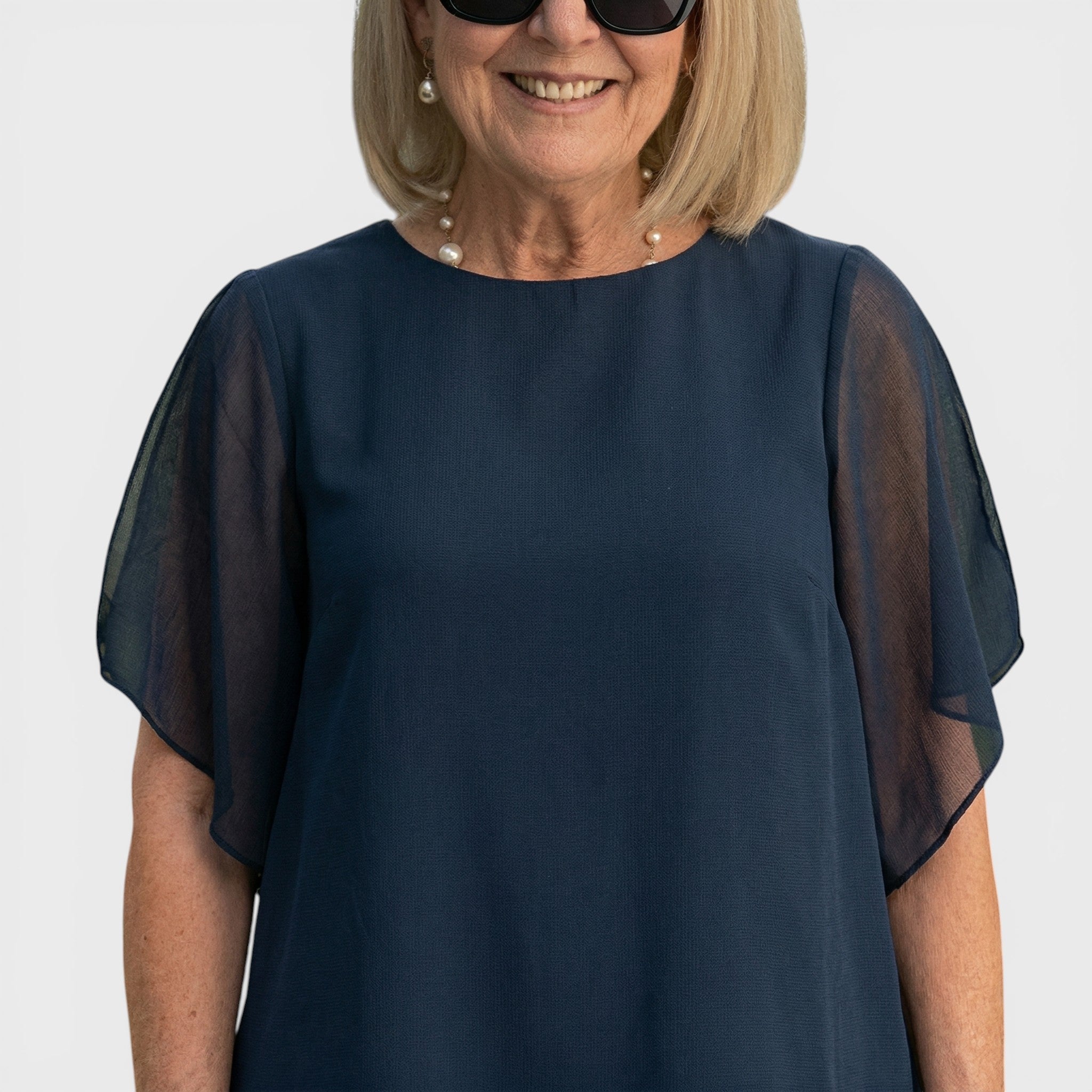 Navy chiffon sheer-sleeve top with relaxed fit and crew neckline