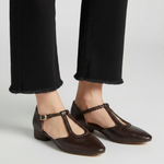 Black leather pointed-toe flats with braided ankle strap and low block heel