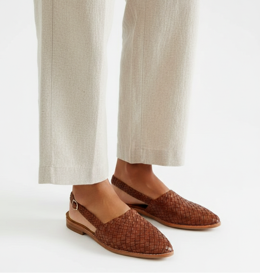Summer loafers in brown woven leather with low sole and back strap detail