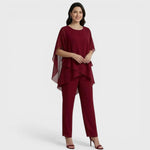 Burgundy chiffon elegant top and wide-leg pants set with asymmetrical hem