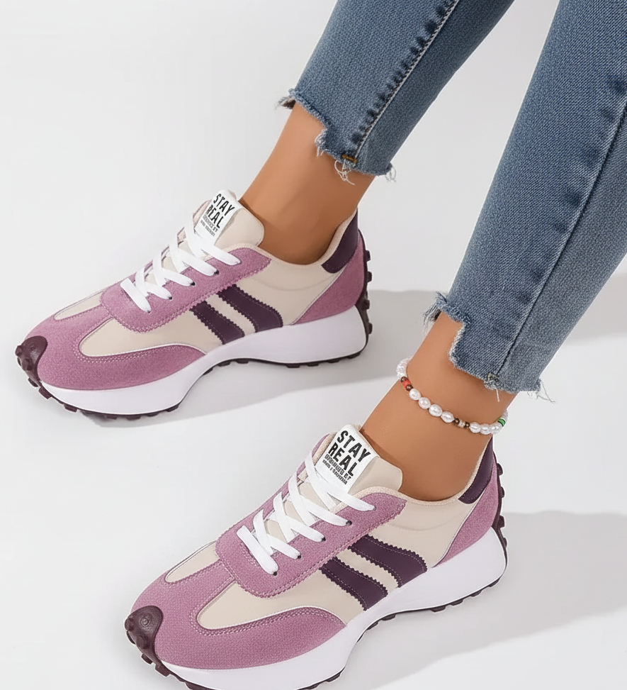 Violet and white sport sneakers with striped detail, lace-up design, thick rubber sole