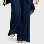 Navy chiffon wide-leg pants with sheer overlay at the hem