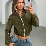 Olive green short bomber jacket with front zipper and side pockets