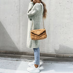 Long light green knit cardigan, draped fit, open front with ribbed cuffs and hem.