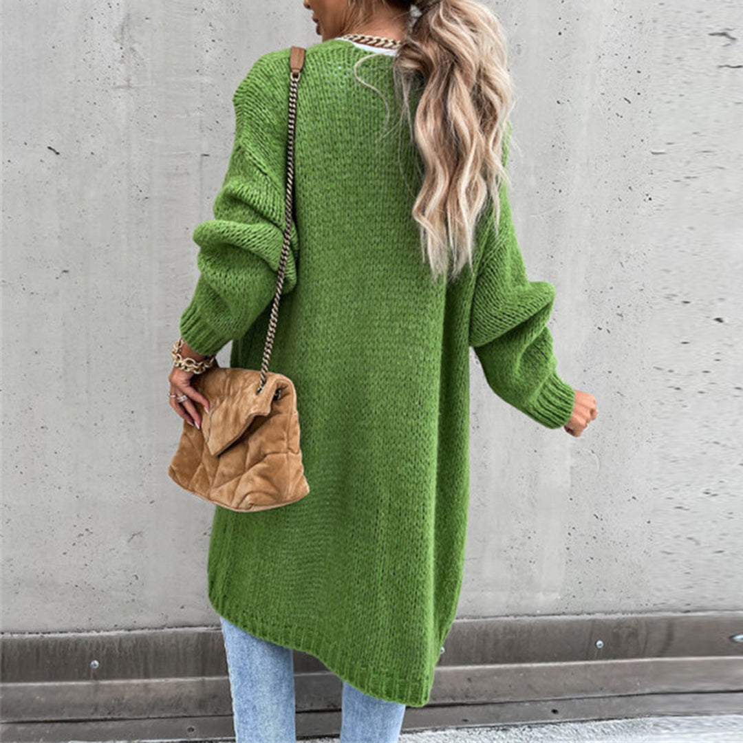 Long green knit cardigan with open front and side pockets, back close-up