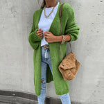 Long green knit cardigan with open front and long sleeves, side pockets