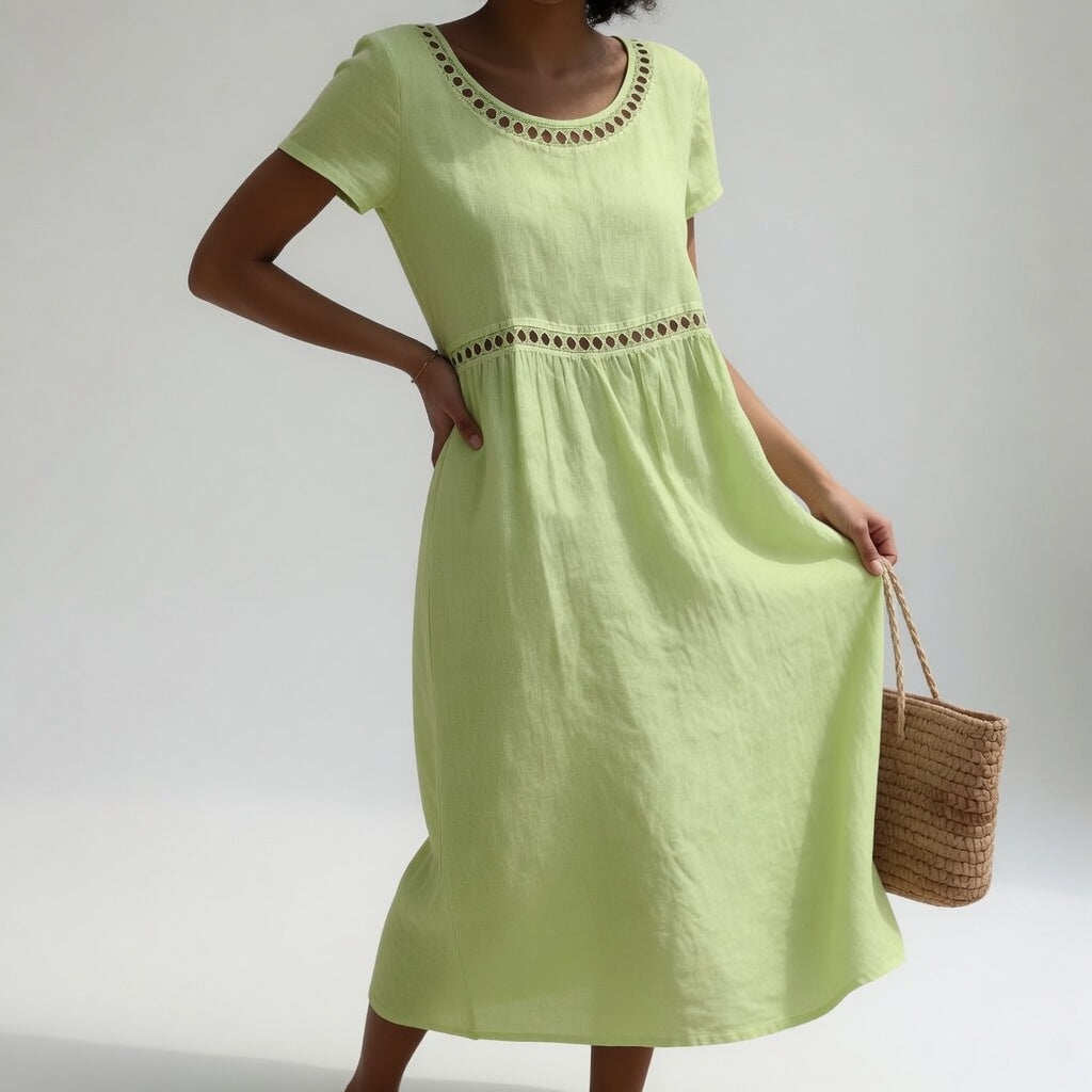 Light green embroidered midi dress with round eyelet-trim neckline and short sleeves