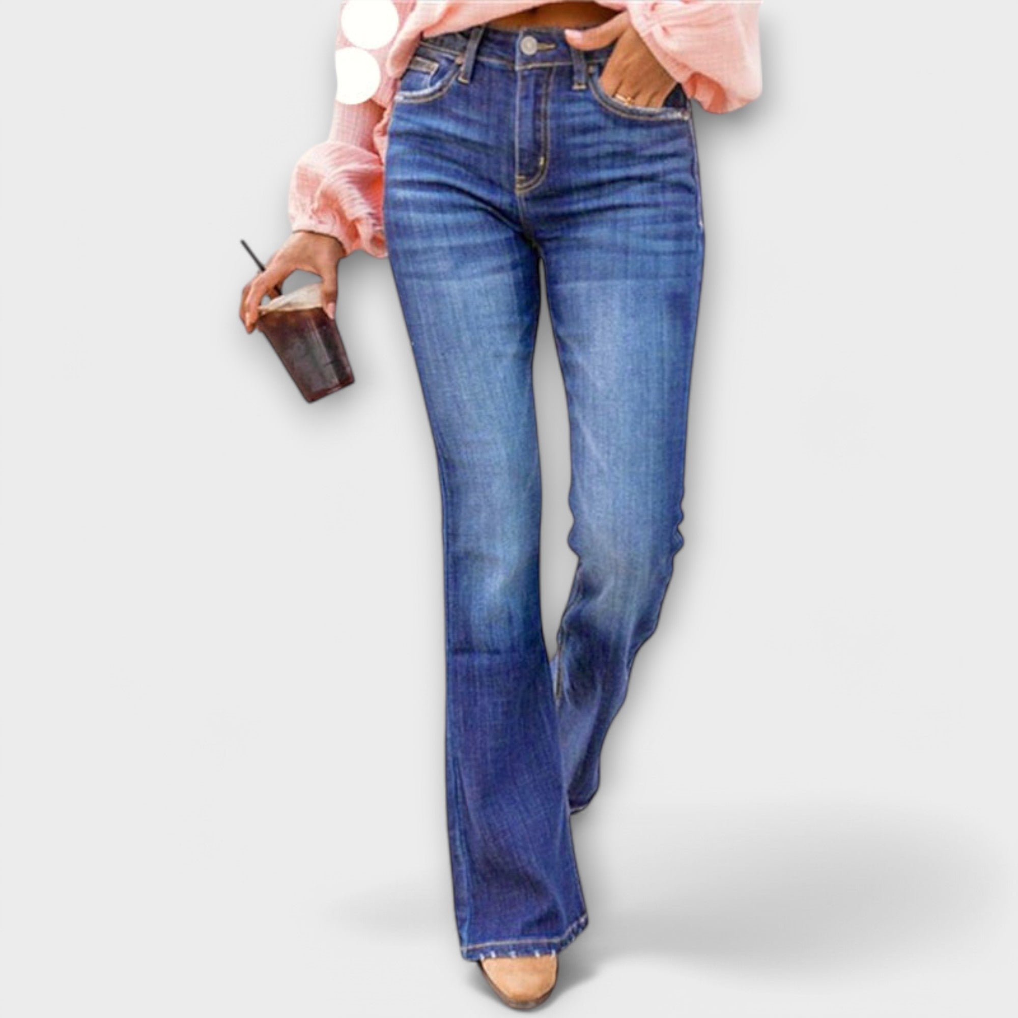 Blue denim straight-leg pants with button fly, belt loops, and five-pocket styling
