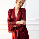 Red satin robe with deep V front, lace sleeves, and self-tie waist sash
