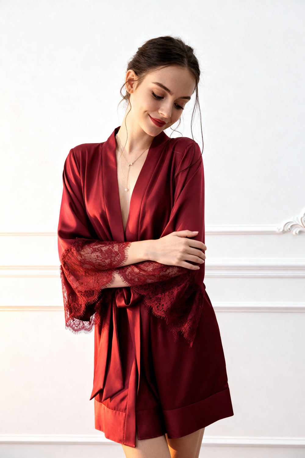 Red satin robe with deep V front, lace sleeves, and self-tie waist sash