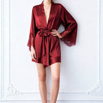 Red satin short robe with deep V neckline, lace-trim sleeves, and waist tie