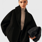 Black tweed-look coat with wide lapels and front buttons, side flap pockets