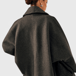 Dark gray tweed-look coat, back view, wide collar and relaxed shoulder shape