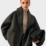 Dark gray tweed-look coat with shawl lapels and two front buttons, side flap pockets