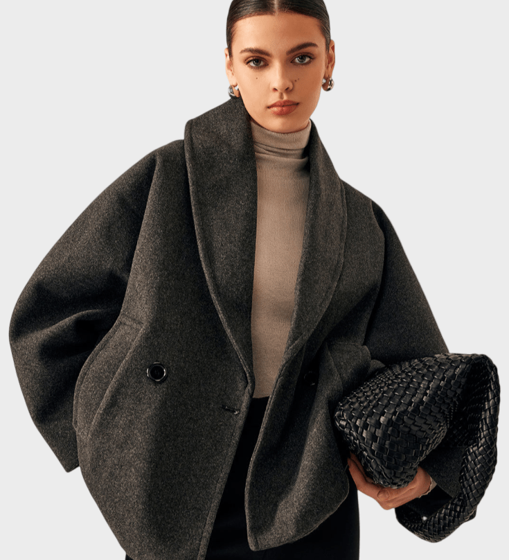 Dark gray tweed-look coat with shawl lapels and two front buttons, side flap pockets