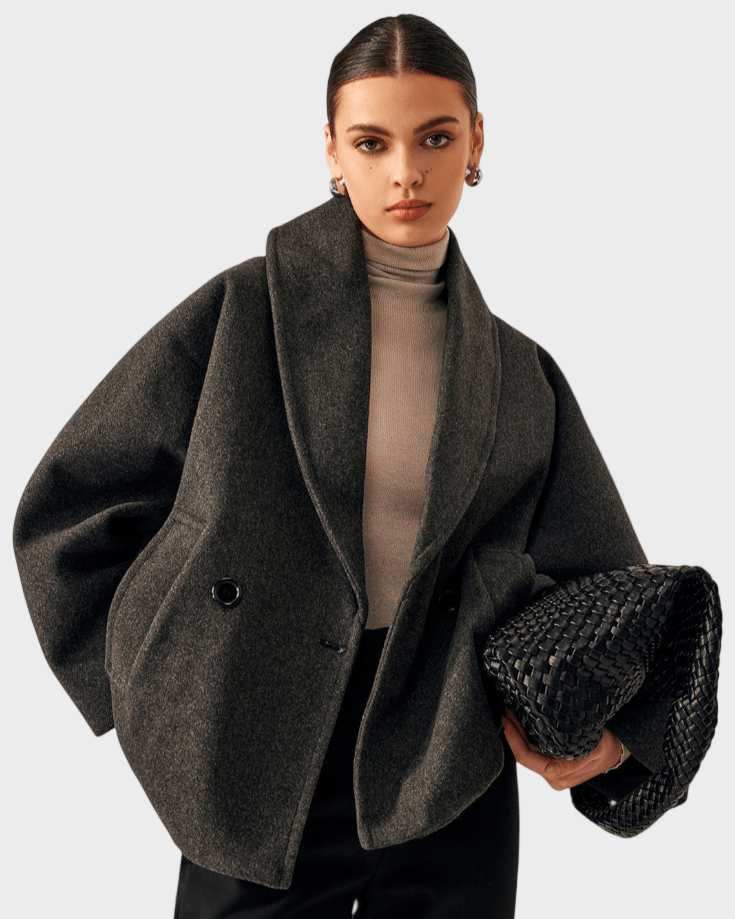 Dark gray tweed-look coat with shawl lapels and two front buttons, side flap pockets