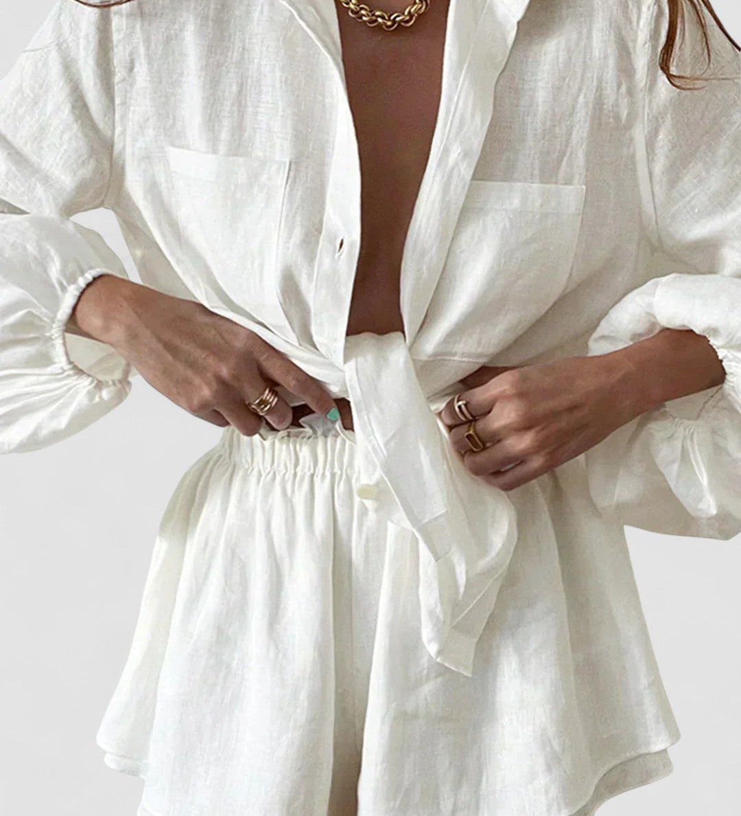 Lined two-piece shorts set, white blouse-style top and elastic waist shorts