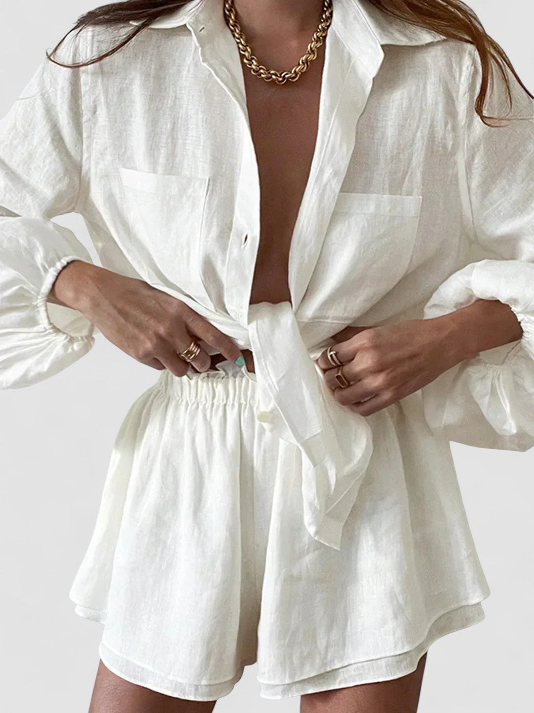Lined two-piece shorts set, white blouse-style top and elastic waist shorts