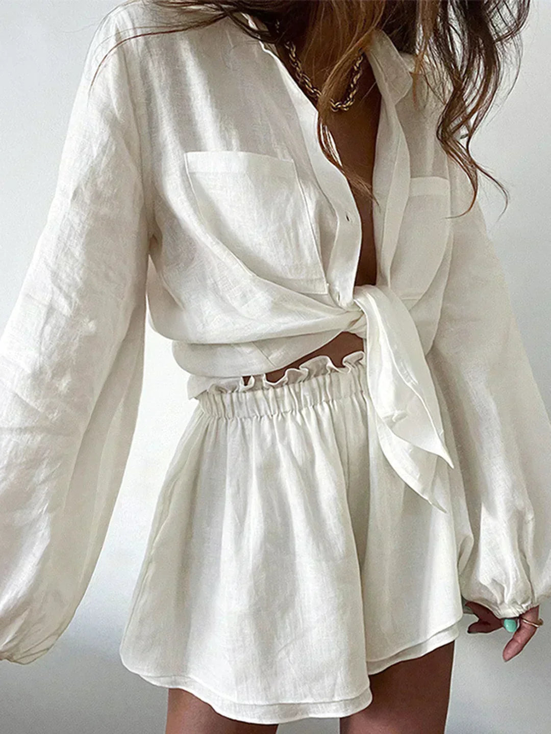 Lined two-piece shorts set, white long-sleeve top with gathered elastic waist shorts