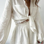 Lined two-piece shorts set, white long-sleeve top with gathered elastic waist shorts