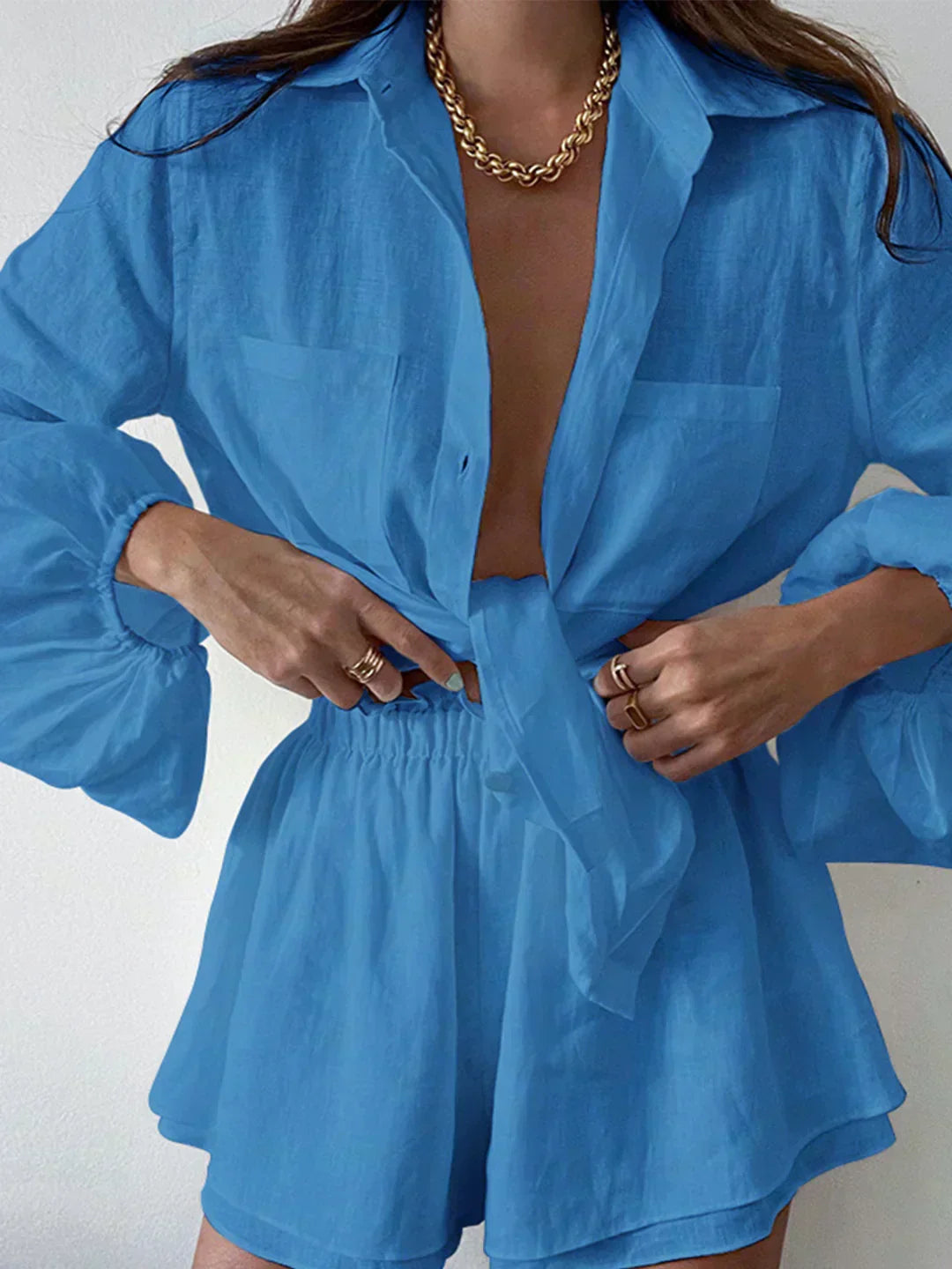 Lined two-piece shorts set, blue V-neck long-sleeve top and elastic waist shorts