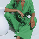 Green oversized wide-leg pants set, V-neck tunic tied at the waist