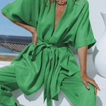 Green belted oversized tunic with matching wide-leg trousers, V-neck front