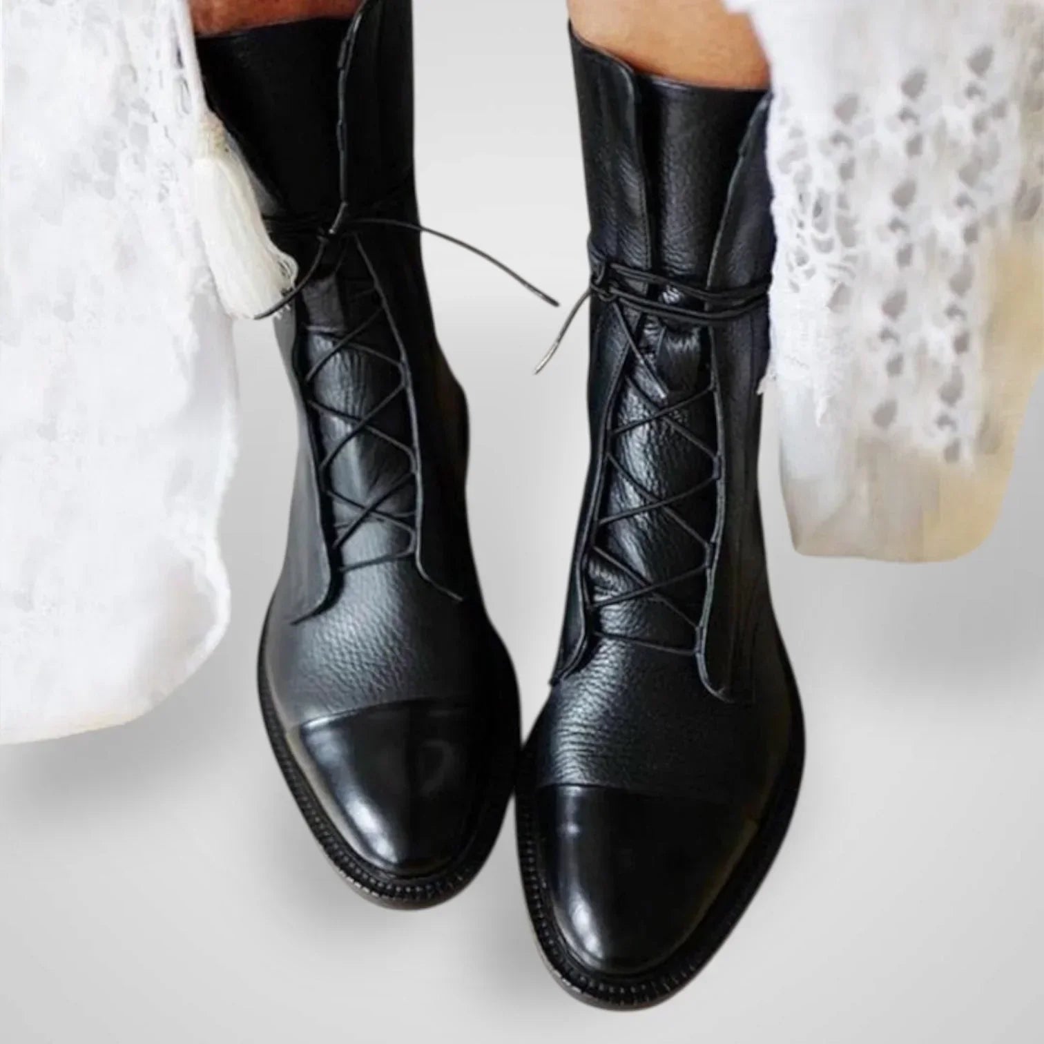 Vigi black leather lace-up ankle boots with crisscross laces and smooth textured finish
