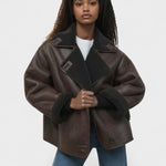 Women’s dark faux leather jacket with shearling-trim collar and flap pockets