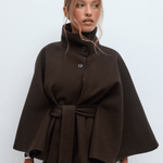 Dark brown belted jacket with high neck and button front, cape sleeves