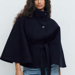 Navy belted jacket with high neck and button front, cape sleeves