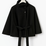 Black short cape jacket with button front and waist tie belt