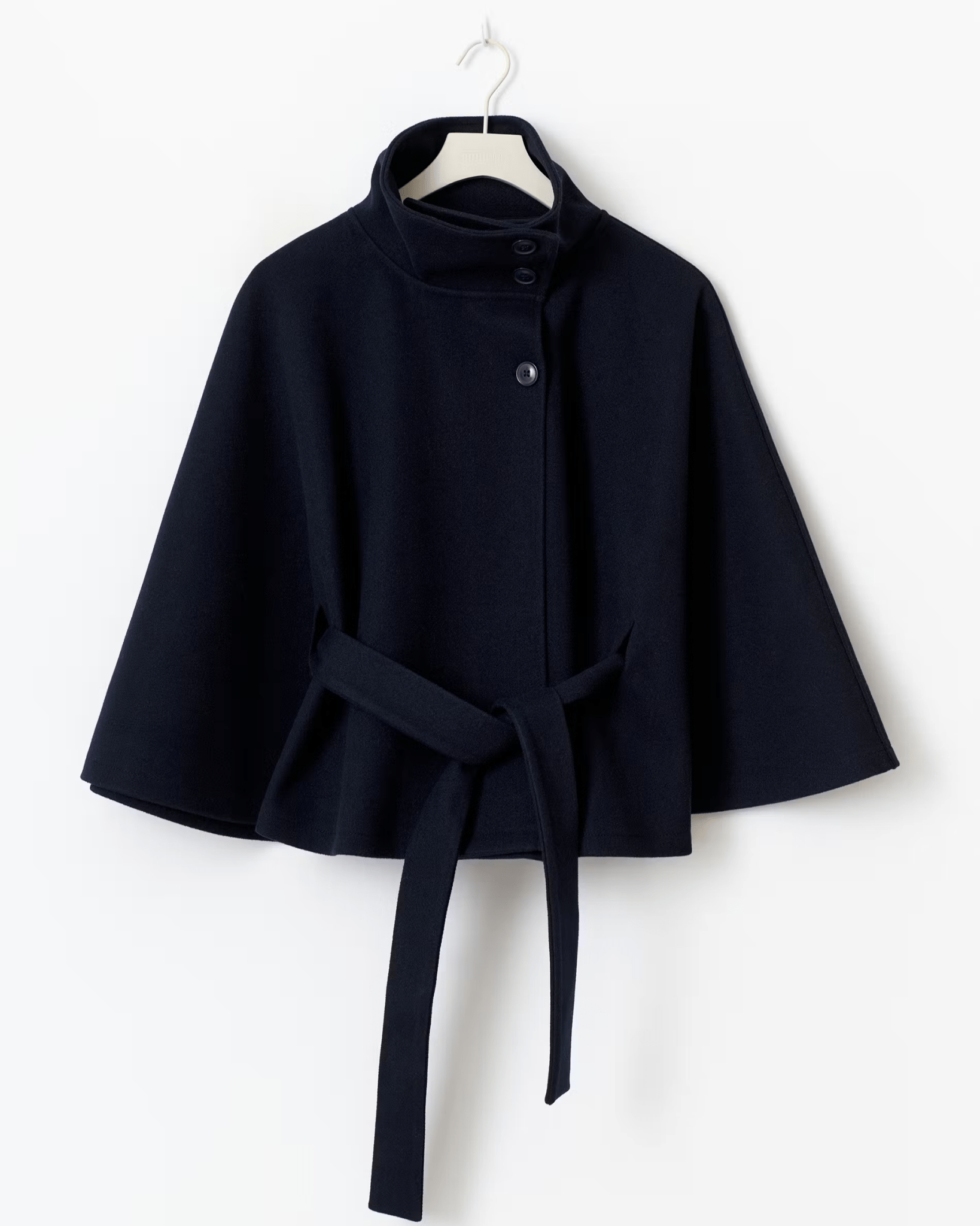 Midnight blue short cape jacket with button front and waist tie belt