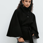 Black belted jacket with high neck and button front, cape sleeves