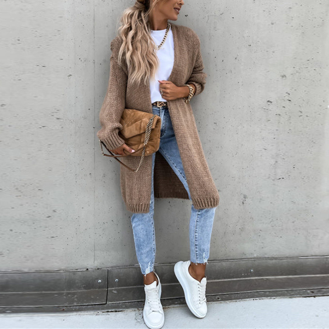 Long taupe knit cardigan with open front and side pockets, full front view
