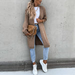 Long taupe knit cardigan with open front and side pockets, full front view