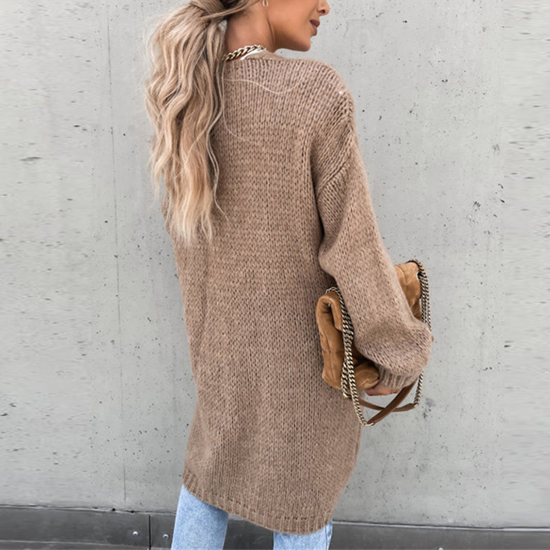 Long taupe knit cardigan with open front and side pockets, back view