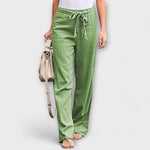 Green linen drawstring pants with straight legs