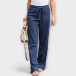 Blue linen drawstring pants with relaxed straight legs