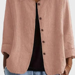 Light rose button-front jacket with notch collar and long sleeves
