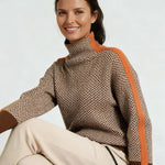High-neck chevron sweater with long sleeves and orange contrast trim at shoulders