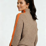 High-neck chevron sweater with orange contrast trim along sleeves, ribbed hem and cuffs