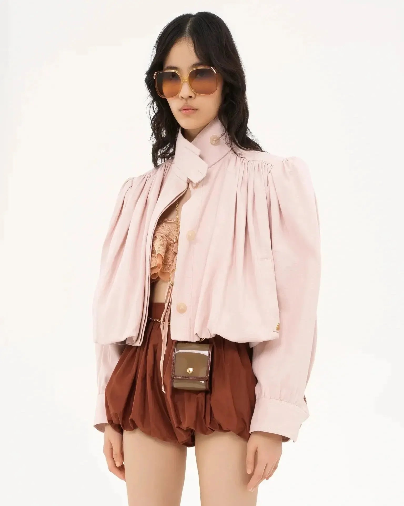 Pink short loose jacket with button front, pleated yoke, and voluminous balloon sleeves