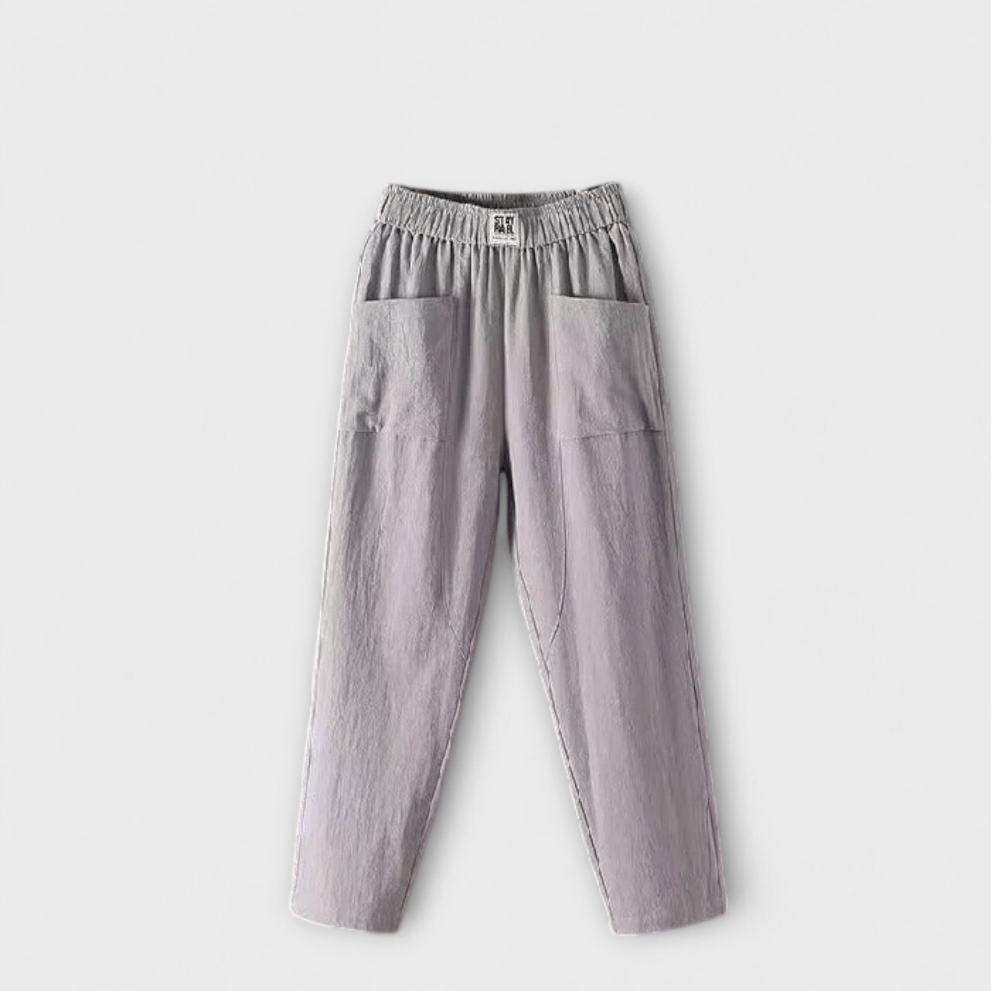 Linen trousers in dusty gray with elastic waistband and side patch pockets